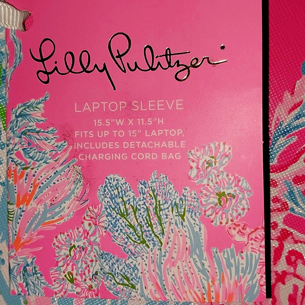 Lilly Pulitzer Laptop Sleeve NWT includes bag for charging cord.